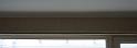 Can you see the bend ? (clue: the curtain rail is straight)